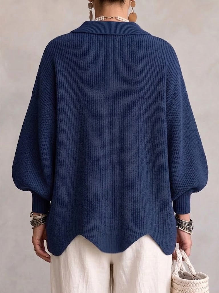 Woman wearing oversized cardigan with lantern sleeves