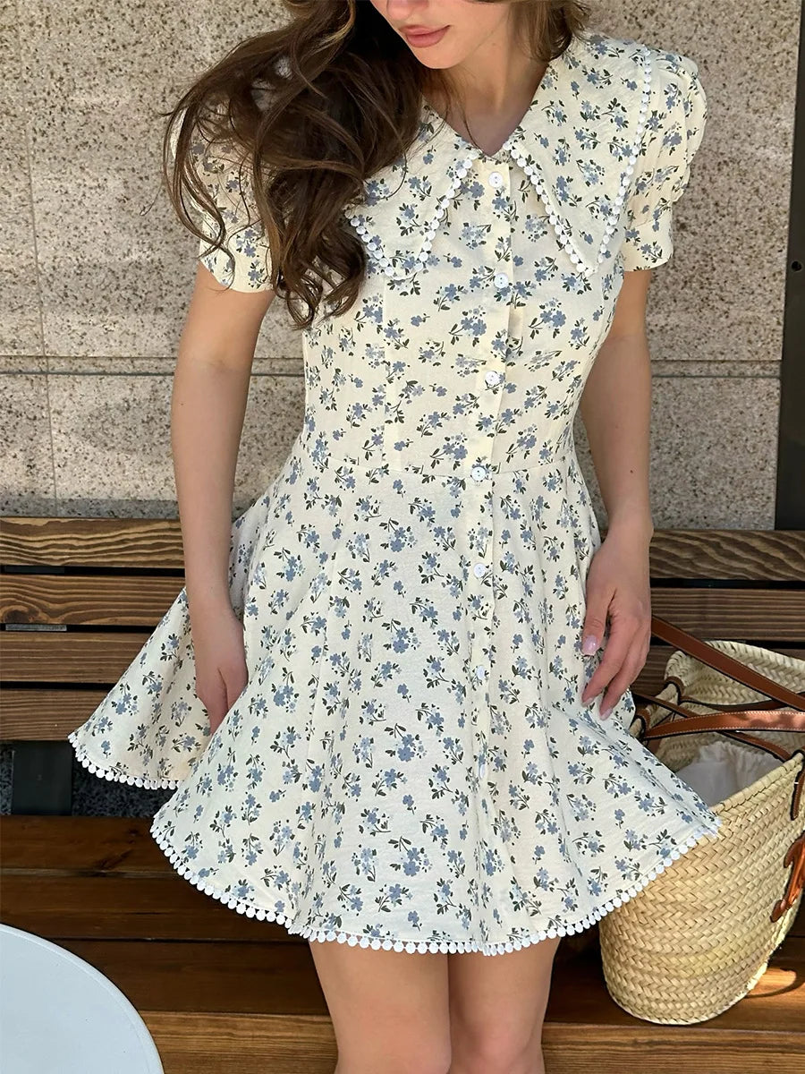 Women's Floral Print Peter Pan Collar Mini Dress with Puff Sleeves and Pom-Pom Hem