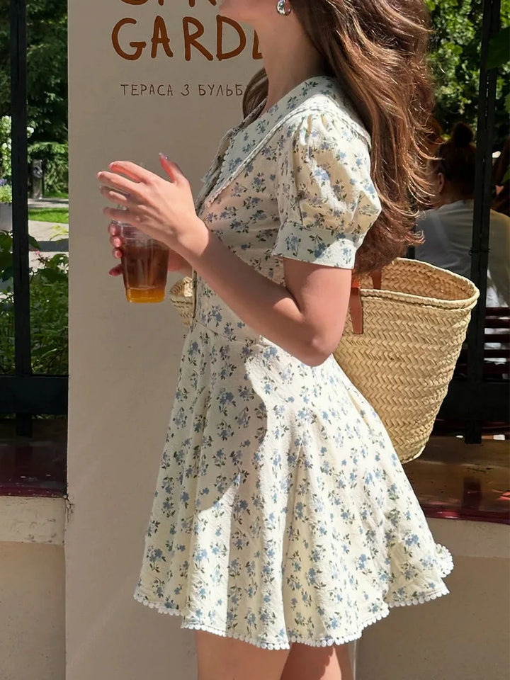 Women's Floral Print Peter Pan Collar Mini Dress with Puff Sleeves and Pom-Pom Hem