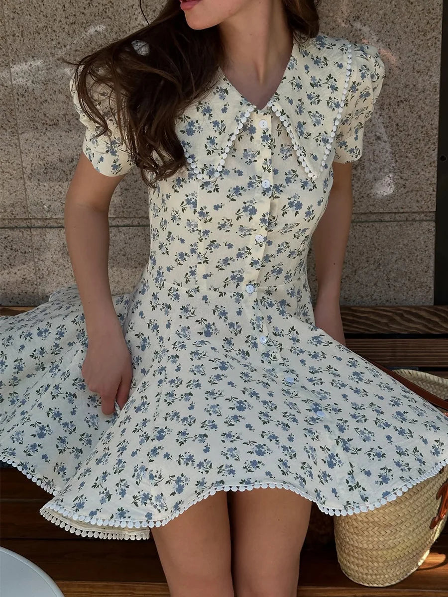 Women's Floral Print Peter Pan Collar Mini Dress with Puff Sleeves and Pom-Pom Hem