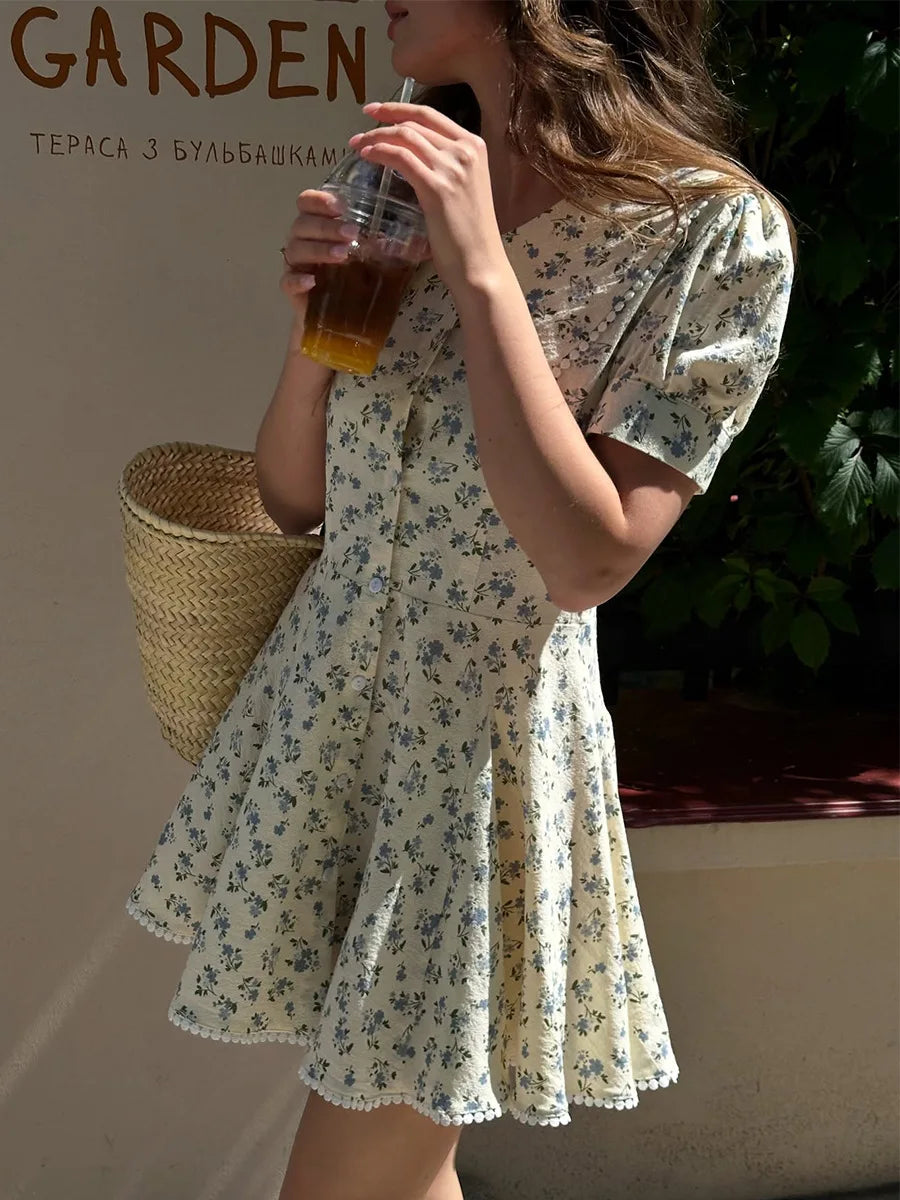 Women's Floral Print Peter Pan Collar Mini Dress with Puff Sleeves and Pom-Pom Hem