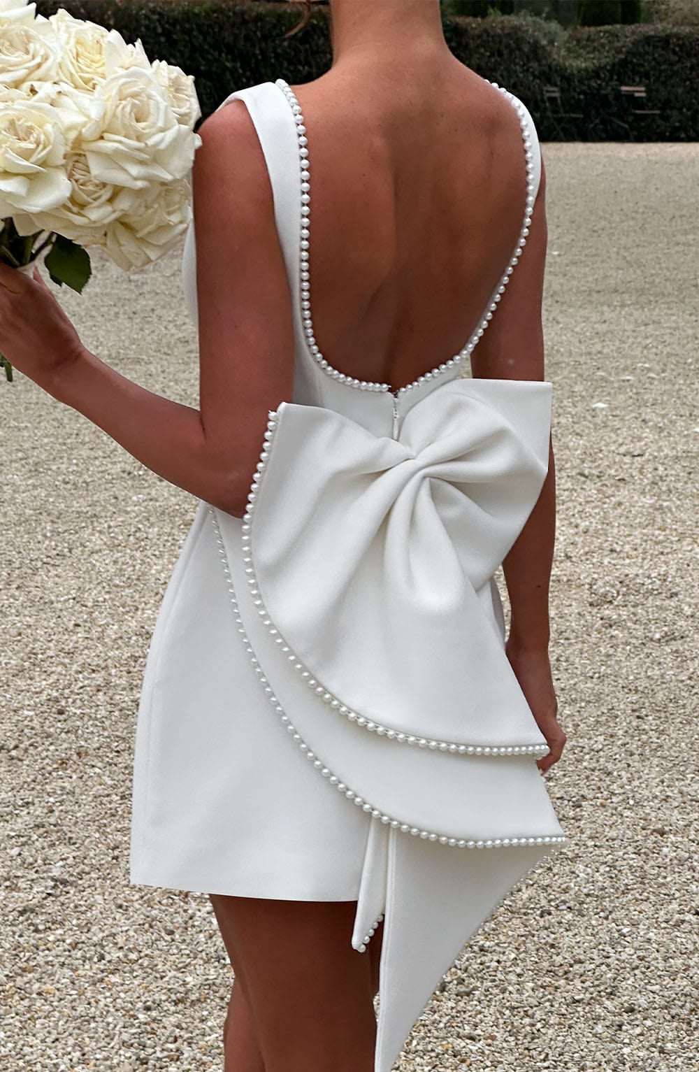 Women's Sleeveless Bead-Trimmed Mini Dress with Open Back and Oversized Bow